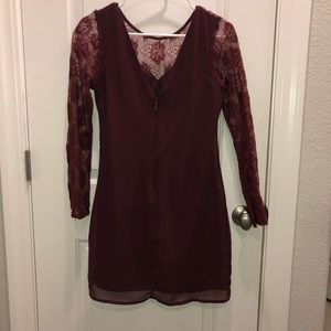 Maroon mini dress with long lace sleeves.